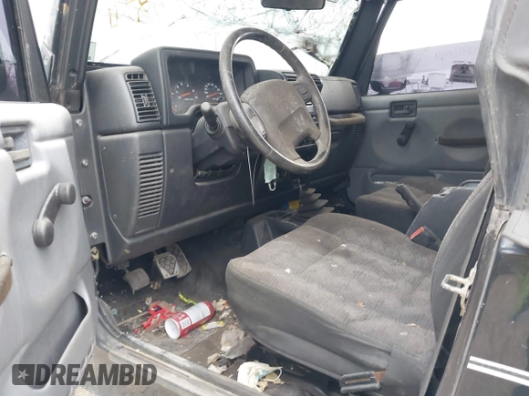 2003 Jeep Wrangler X with VIN 1J4FA39S33P375741, listed as a IAAI auction lot 40858427 with Not provided miles and . Bid and sale history available at DreamBid. Image 5.