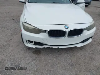 2015 BMW 3 Series 328i with VIN WBA3A5C50FF608327, listed as a IAAI auction lot 42136156 with 213,945 mi miles. Bid and sale history available at carsss.com. Image 6.
