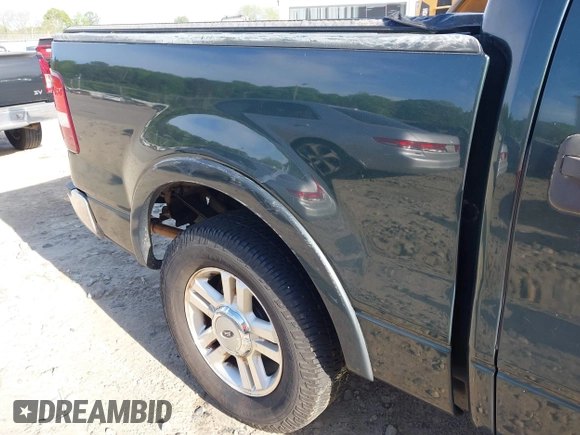 2004 Ford F-150 XLT with VIN 1FTPW12554KB97317, listed as a IAAI auction lot 42076458 with 234,619 mi miles. Bid and sale history available at carsss.com. Image 6.