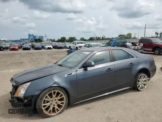 2011 Cadillac CTS Performance with VIN 1G6DM5ED7B0121984, listed as a Copart auction lot 83187574 with 105,050 mi miles and Non Repairable. Bid and sale history available at DreamBid. Image 1.