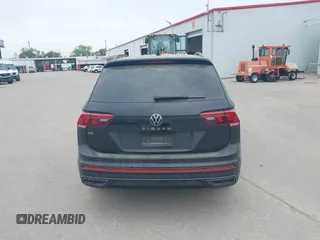 2023 Volkswagen Tiguan SE R-Line Black with VIN 3VVCB7AX1PM106543, listed as a IAAI auction lot 41784559 with 39,846 mi miles and . Bid and sale history available at DreamBid. Image 17.