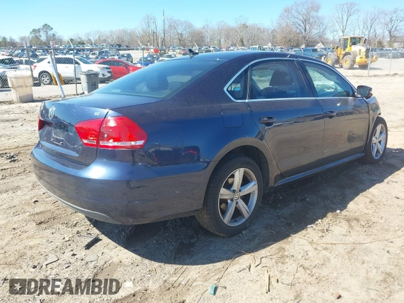 2013 Volkswagen Passat SE w/Sunroof & Nav with VIN 1VWBP7A35DC113692, listed as a IAAI auction lot 41720111 with 143,624 mi miles. Bid and sale history available at carsss.com. Image 4.