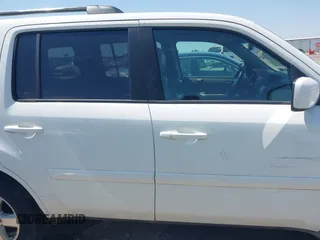 2009 Honda Pilot EX-L with VIN 5FNYF48619B022699, listed as a IAAI auction lot 42016173 with 204,190 mi miles and . Bid and sale history available at carsss.com. Image 13.