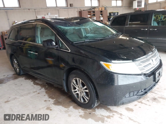 2012 Honda Odyssey EX z VIN 5FNRL5H4XCB017557, wystawiony jako IAAI lot #42367322 z przebiegiem 209 630 mil mil oraz . Historia ofert i sprzedaży dostępna na DreamBid. Obrazek 1.