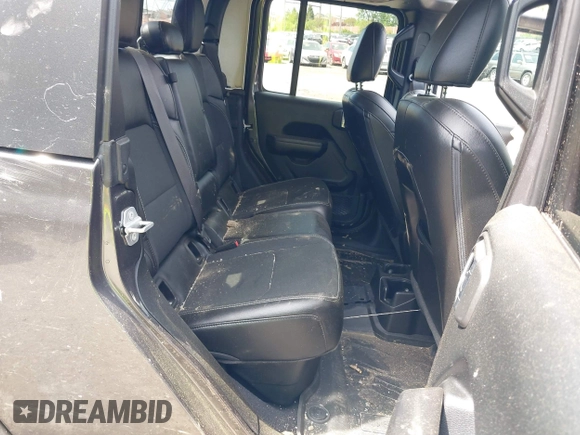 2021 Jeep Gladiator Freedom with VIN 1C6HJTAG3ML557932, listed as a IAAI auction lot 42150245 with 26,656 mi miles and . Bid and sale history available at DreamBid. Image 8.
