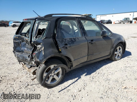 2007 Suzuki SX4 z VIN JS2YB413975110576, wystawiony jako Copart lot #47078645 z przebiegiem 170 280 mil mil oraz Szkoda całkowita • Salvage title. Historia ofert i sprzedaży dostępna na DreamBid. Obrazek 3.