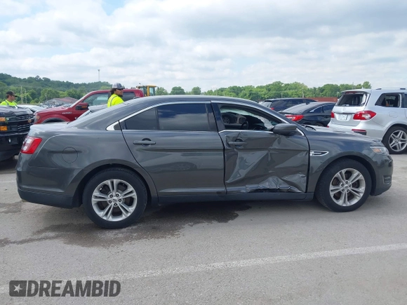 2015 Ford Taurus SEL with VIN 1FAHP2E83FG175051, listed as a IAAI auction lot 42357517 with 200,033 mi miles and . Bid and sale history available at DreamBid. Image 13.