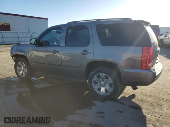 2007 GMC Yukon SLE w/3SA with VIN 1GKFC13C97J311870, listed as a Copart auction lot 44652555 with 142,104 mi miles and Salvage Title. Bid and sale history available at carsss.com. Image 2.