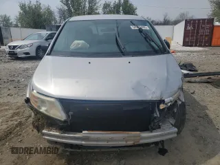 2013 Honda Odyssey LX z VIN 5FNRL5H28DB085114, wystawiony jako Copart lot #52942495 z przebiegiem 158 191 mil mil oraz Szkoda całkowita • Salvage title. Historia ofert i sprzedaży dostępna na DreamBid. Obrazek 5.