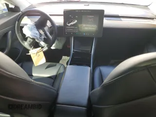 2020 Tesla Model 3 Standard Range Plus with VIN 5YJ3E1EA6LF661513, listed as a Copart auction lot 47008985 with 128,362 mi miles and Non Repairable. Bid and sale history available at DreamBid. Image 8.