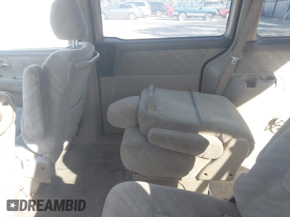 2004 Honda Odyssey EX with VIN 5FNRL18644B122591, listed as a IAAI auction lot 42207036 with 166,179 mi miles and . Bid and sale history available at DreamBid. Image 8.