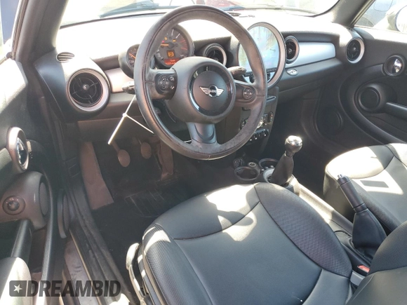 2015 MINI Convertible with VIN WMWZN3C56FT266838, listed as a Copart auction lot 50250745 with 60,331 mi miles and Salvage title. Bid and sale history available at DreamBid. Image 8.