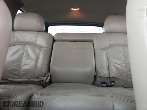2001 Chevrolet Tahoe LS z VIN 1GNEC13T81R152119, wystawiony jako Copart lot #51171165 z przebiegiem 191 740 mil mil oraz Czysty tytuł • Clean title. Historia ofert i sprzedaży dostępna na DreamBid. Obrazek 10.