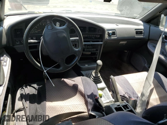1993 Subaru Legacy L with VIN 4S3BJ6339P6948161, listed as a Copart auction lot 63123584 with 329,619 mi miles and Salvage Title. Bid and sale history available at DreamBid. Image 8.