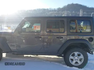 2022 Jeep Wrangler Unlimited Sport with VIN 1C4HJXDG5NW157317, listed as a IAAI auction lot 41374590 with 67,632 mi miles and . Bid and sale history available at DreamBid. Image 15.
