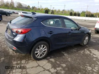 2015 Mazda 3 i Touring with VIN 3MZBM1L78FM235597, listed as a Copart auction lot 51717005 with 57,186 mi miles and Salvage title. Bid and sale history available at DreamBid. Image 3.