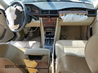 1995 Mercedes-Benz E Class with VIN WDBEA32E1SC242552, listed as a Copart auction lot 52433285 with 211,669 mi miles and Salvage Title. Bid and sale history available at carsss.com. Image 8.