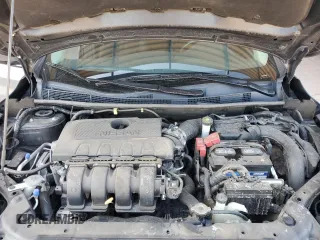 2018 Nissan Sentra SV z VIN 3N1AB7AP0JL656399, wystawiony jako Copart lot #57128935 z przebiegiem 146 925 mil mil oraz Szkoda całkowita • Salvage title. Historia ofert i sprzedaży dostępna na DreamBid. Obrazek 11.