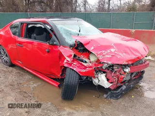 2015 Scion tC z VIN JTKJF5C79FJ013303, wystawiony jako IAAI lot #41581714 z przebiegiem Nie podano mil oraz . Historia ofert i sprzedaży dostępna na DreamBid. Obrazek 17.