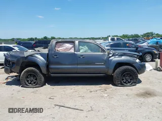 2009 Toyota Tacoma with VIN 3TMLU42N39M030914, listed as a IAAI auction lot 42471262 with Not provided miles and . Bid and sale history available at DreamBid. Image 13.