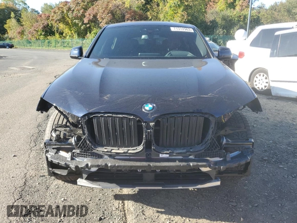 2021 BMW X4 M40i with VIN 5UX2V5C05M9H59295, listed as a Copart auction lot 71312963 with 31,050 mi miles. Bid and sale history available at carsss.com. Image 5.