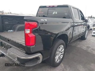 2024 Chevrolet Silverado 1500 LTZ with VIN 1GCUDGEL3RZ105870, listed as a IAAI auction lot 41681311 with 7,421 mi miles and . Bid and sale history available at DreamBid. Image 4.
