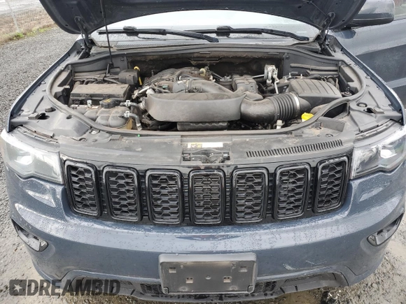 2018 Jeep Grand Cherokee Altitude with VIN 1C4RJFAG5JC219944, listed as a Copart auction lot 52030365 with 99,463 mi miles and Salvage title. Bid and sale history available at DreamBid. Image 14.