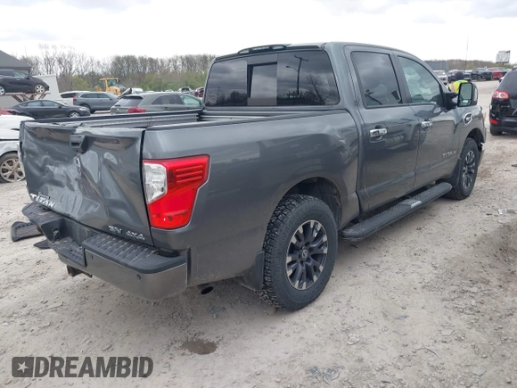 2017 Nissan Titan Platinum Reserve z VIN 1N6AA1E5XHN530256, wystawiony jako IAAI lot #42031654 z przebiegiem 97 200 mil mil oraz . Historia ofert i sprzedaży dostępna na DreamBid. Obrazek 4.