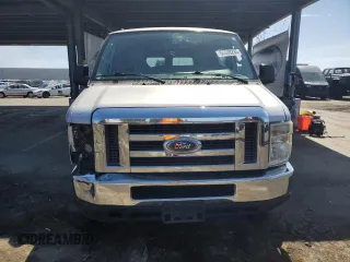 2010 Ford Econoline Passenger XL with VIN 1FMNE1BW3ADA25124, listed as a Copart auction lot 56899235 with 244,010 mi miles and Salvage title. Bid and sale history available at DreamBid. Image 5.