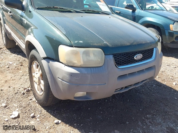 2001 Ford Escape XLT with VIN 1FMCU03121KF56950, listed as a IAAI auction lot 41768628 with 265,069 mi miles. Bid and sale history available at carsss.com. Image 6.