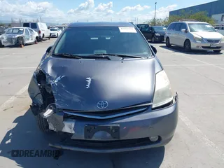 2007 Toyota Prius z VIN JTDKB20U273215633, wystawiony jako IAAI lot #41955538 z przebiegiem 172 957 mil mil oraz . Historia ofert i sprzedaży dostępna na DreamBid. Obrazek 12.