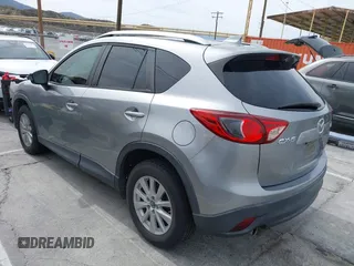 2014 Mazda CX-5 Touring with VIN JM3KE2CY3E0429025, listed as a IAAI auction lot 41680713 with 113,065 mi miles. Bid and sale history available at carsss.com. Image 3.