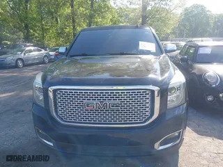 2015 GMC Yukon XL Denali with VIN 1GKS1JKJ5FR653076, listed as a IAAI auction lot 42072132 with 288,568 mi miles. Bid and sale history available at carsss.com. Image 12.