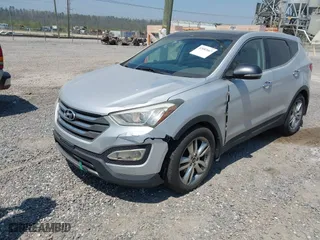 2013 Hyundai Santa Fe 2.0T Sport with VIN 5XYZWDLAXDG057954, listed as a IAAI auction lot 42082667 with 186,678 mi miles. Bid and sale history available at carsss.com. Image 2.