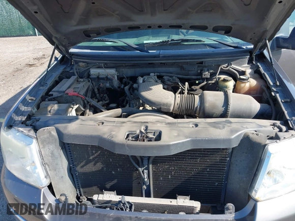 2005 Ford F-150 STX with VIN 1FTRX12W15KD34012, listed as a IAAI auction lot 41991377 with 178,984 mi miles and . Bid and sale history available at DreamBid. Image 10.