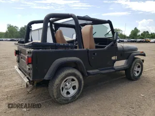 1992 Jeep Wrangler with VIN 2J4FY29S0NJ554857, listed as a Copart auction lot 64522985 with 245,263 mi miles and Clean title. Bid and sale history available at DreamBid. Image 3.