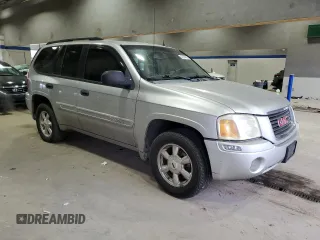 2005 GMC Envoy SLT with VIN 1GKDT13S652197929, listed as a Copart auction lot 42104855 with 228,515 mi miles and Salvage Title. Bid and sale history available at carsss.com. Image 4.