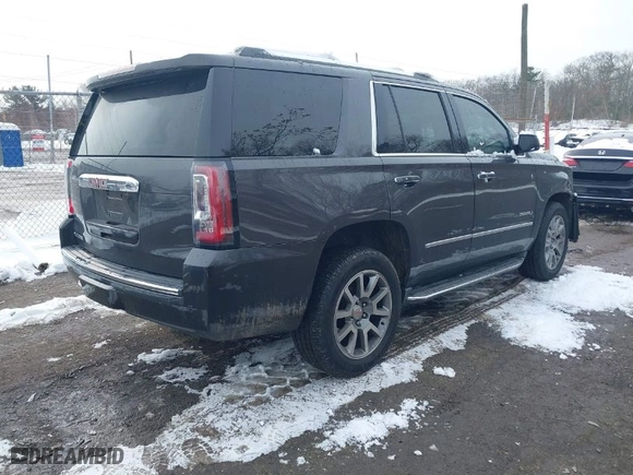 2016 GMC Yukon Denali with VIN 1GKS2CKJ5GR412709, listed as a IAAI auction lot 41530372 with 105,555 mi miles. Bid and sale history available at carsss.com. Image 4.