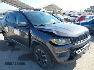2019 Jeep Compass Trailhawk with VIN 3C4NJDDB3KT759849, listed as a IAAI auction lot 42141467 with 100,915 mi miles and . Bid and sale history available at DreamBid. Image 1.