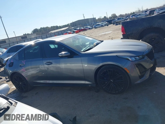 2021 Cadillac CT5 Sport z VIN 1G6DP5RK6M0128539, wystawiony jako IAAI lot #41418733 z przebiegiem 25 332 mil mil oraz . Historia ofert i sprzedaży dostępna na DreamBid. Obrazek 13.