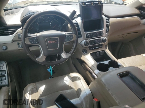 2019 GMC Yukon XL SLT z VIN 1GKS1GKC0KR325305, wystawiony jako Copart lot #56219325 z przebiegiem 136 295 mil mil oraz Szkoda całkowita • Salvage title. Historia ofert i sprzedaży dostępna na DreamBid. Obrazek 8.