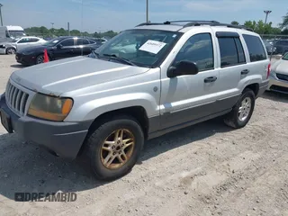 2004 Jeep Grand Cherokee Laredo with VIN 1J4GW48N94C420407, listed as a IAAI auction lot 42689372 with 217,768 mi miles and . Bid and sale history available at DreamBid. Image 2.