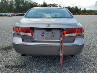 2007 Hyundai Azera SE z VIN KMHFC46FX7A216846, wystawiony jako Copart lot #60035695 z przebiegiem 197 201 mil mil oraz Szkoda całkowita • Salvage title. Historia ofert i sprzedaży dostępna na DreamBid. Obrazek 6.