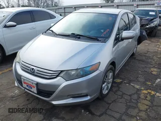 2010 Honda Insight EX with VIN JHMZE2H77AS022538, listed as a IAAI auction lot 41804579 with 184,000 mi miles and . Bid and sale history available at DreamBid. Image 2.