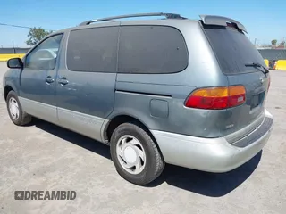2000 Toyota Sienna LE with VIN 4T3ZF13C2YU293649, listed as a IAAI auction lot 42299543 with 139,504 mi miles and . Bid and sale history available at DreamBid. Image 3.