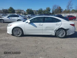 2013 Lexus ES 4dr Sdn with VIN JTHBK1GGXD2077804, listed as a IAAI auction lot 41748571 with 88,000 mi miles. Bid and sale history available at carsss.com. Image 14.