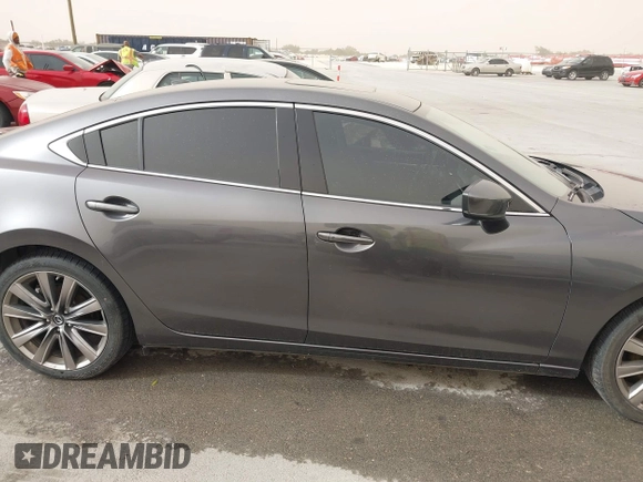 2020 Mazda 6 Signature with VIN JM1GL1XY6L1522900, listed as a IAAI auction lot 41724818 with 62,846 mi miles and . Bid and sale history available at DreamBid. Image 13.