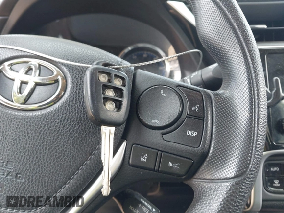2018 Toyota Corolla L with VIN 2T1BURHE1JC052651, listed as a IAAI auction lot 42430958 with 104,664 mi miles and . Bid and sale history available at DreamBid. Image 11.
