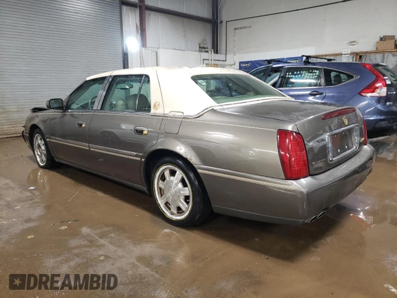 2003 Cadillac DeVille with VIN 1G6KD54Y43U124198, listed as a Copart auction lot 44515215 with 116,006 mi miles and Salvage Title. Bid and sale history available at carsss.com. Image 2.