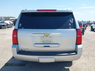 2015 Chevrolet Tahoe LT with VIN 1GNSCBKC6FR303850, listed as a IAAI auction lot 42254115 with 147,856 mi miles and . Bid and sale history available at DreamBid. Image 16.
